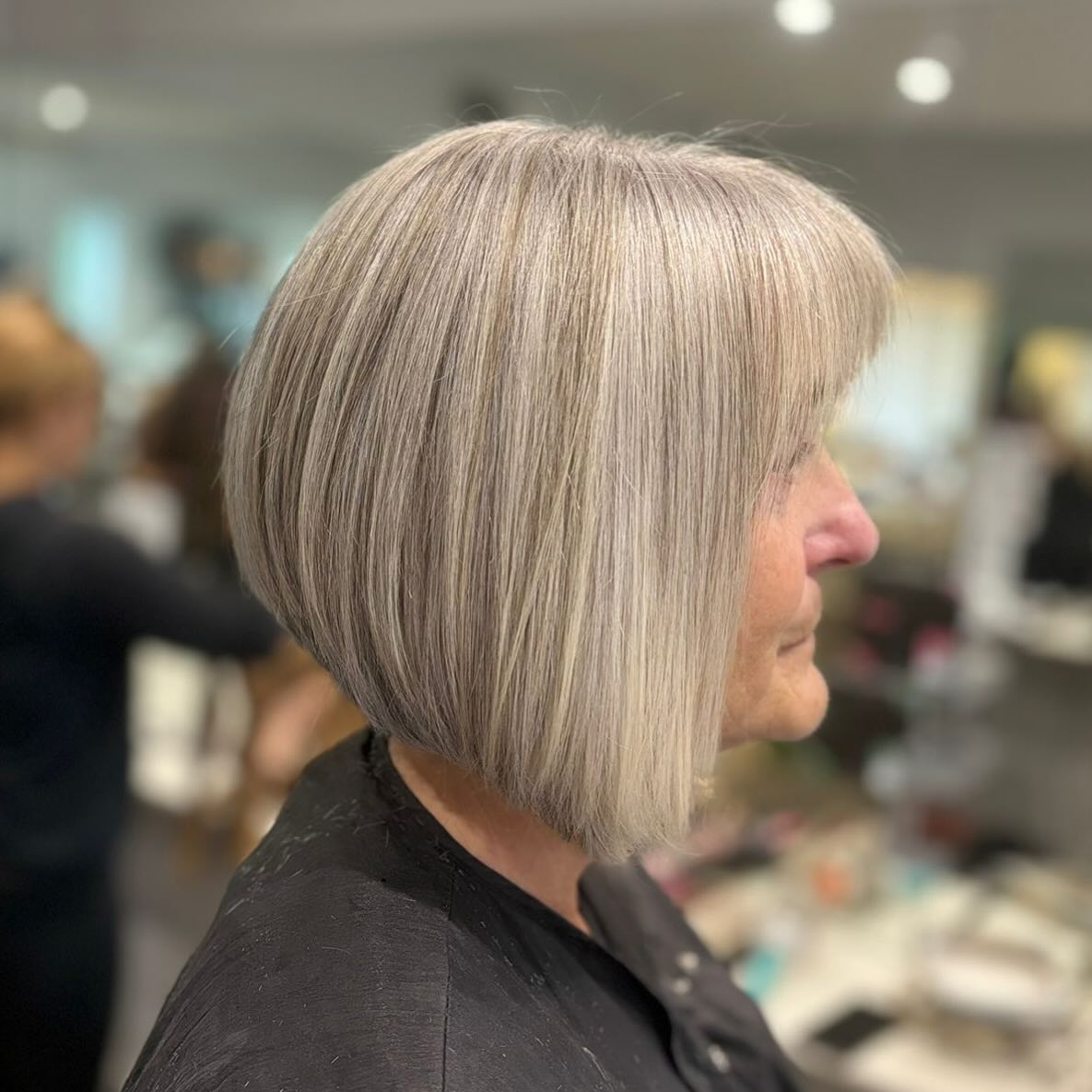 Sleek Ash Blonde Bob with Soft Bangs