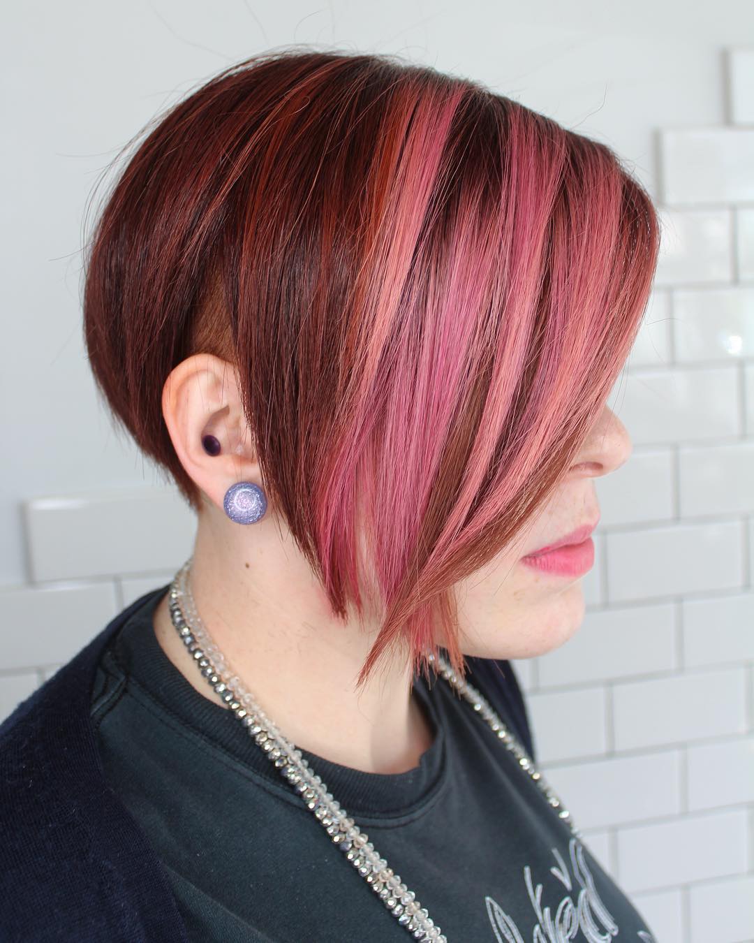 Bold Asymmetrical Pixie with Pink Highlights