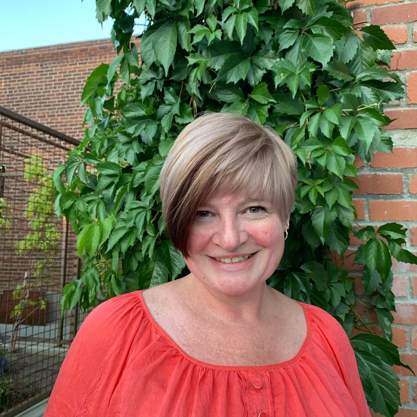 Chic Asymmetrical Pixie with Soft Highlights