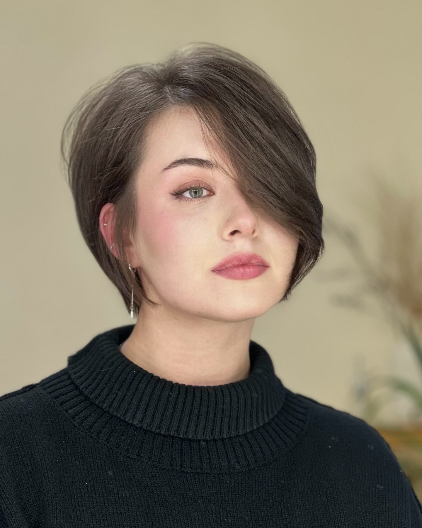 chic textured bob with long side bangs