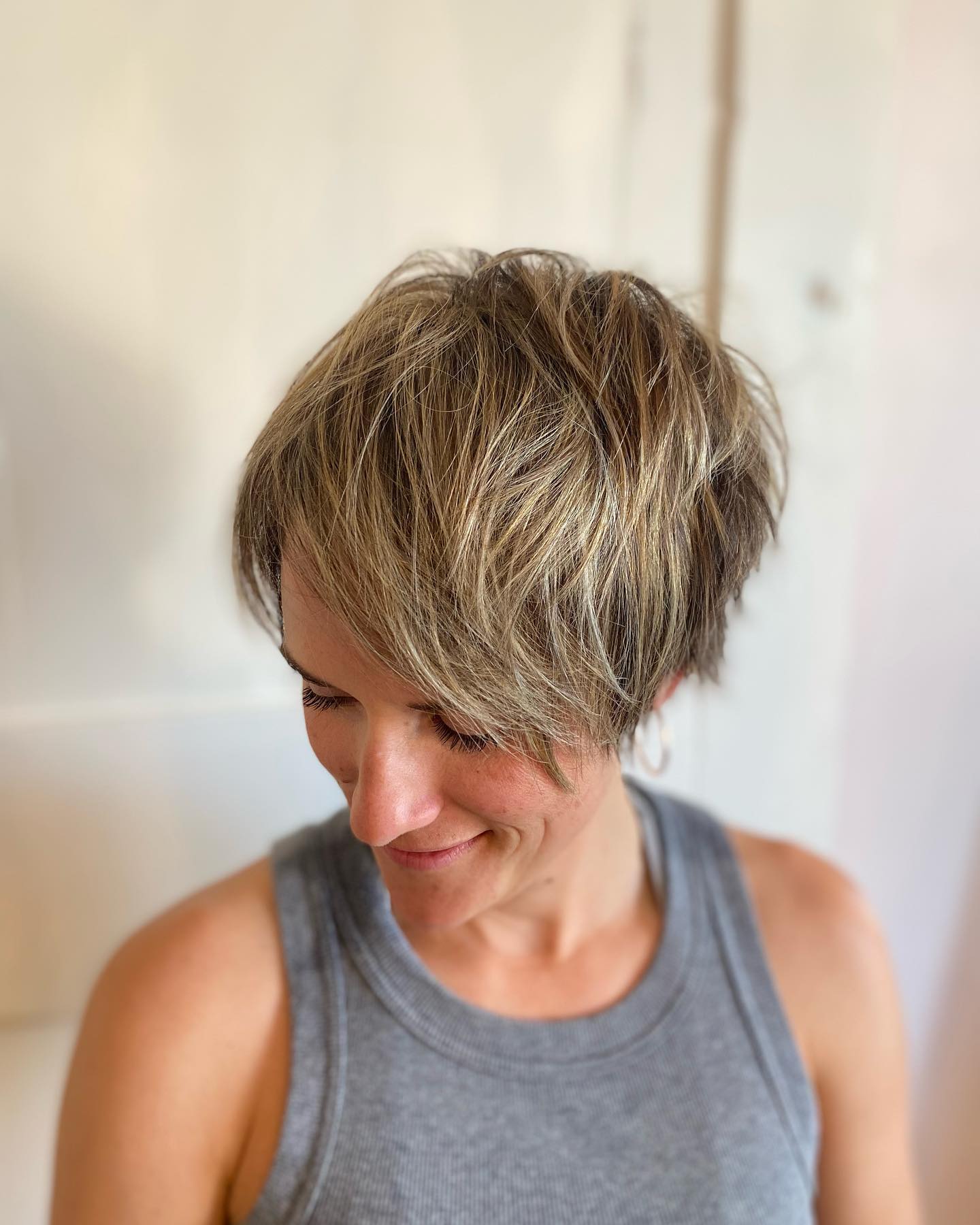 Chic Textured Long Pixie with Bright Highlights