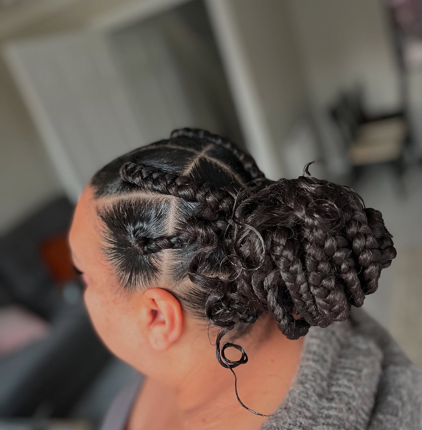 Chic Twisted Jumbo Braid Updo with Defined Sections
