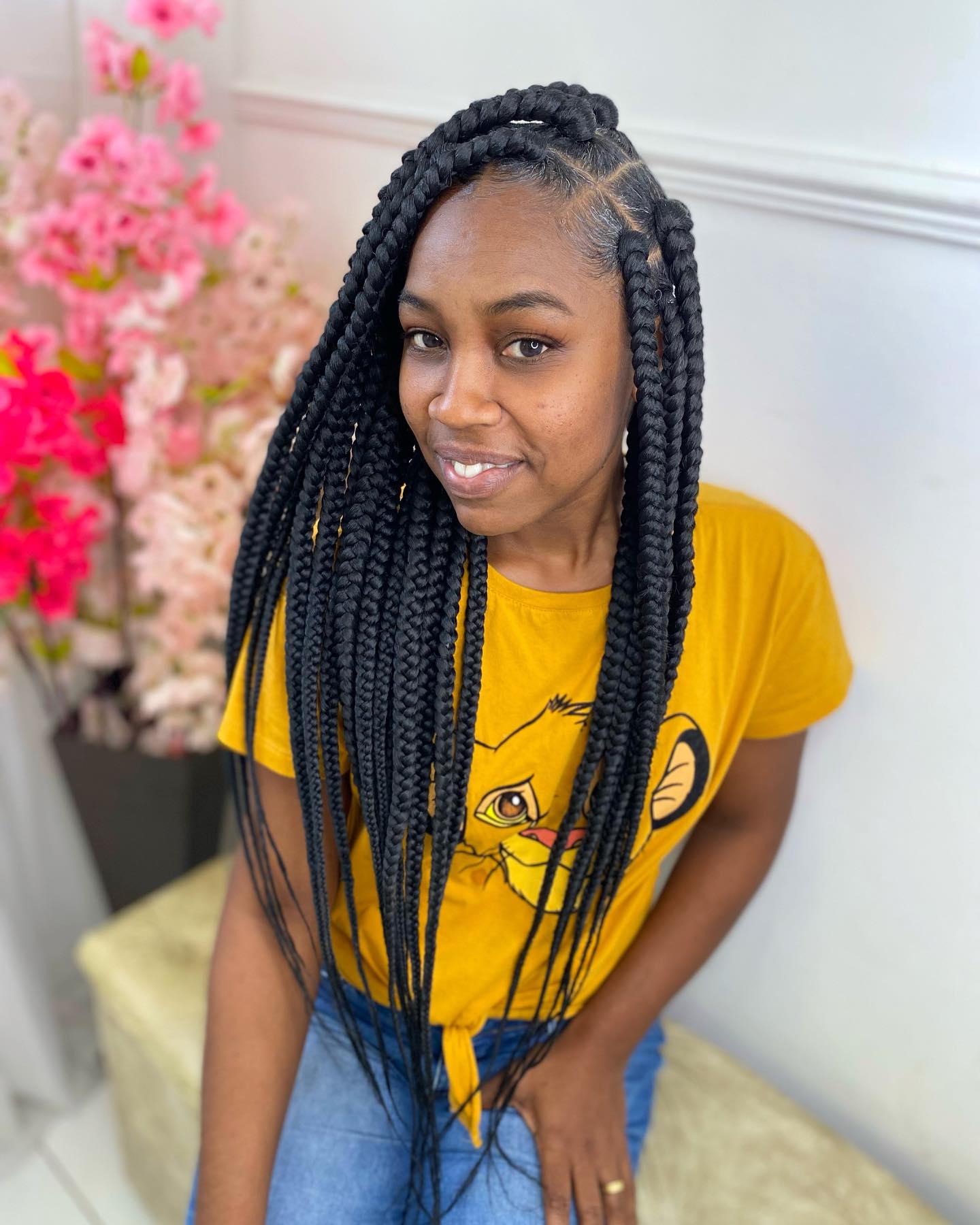 Elegant Long Jumbo Braids with Defined Parting