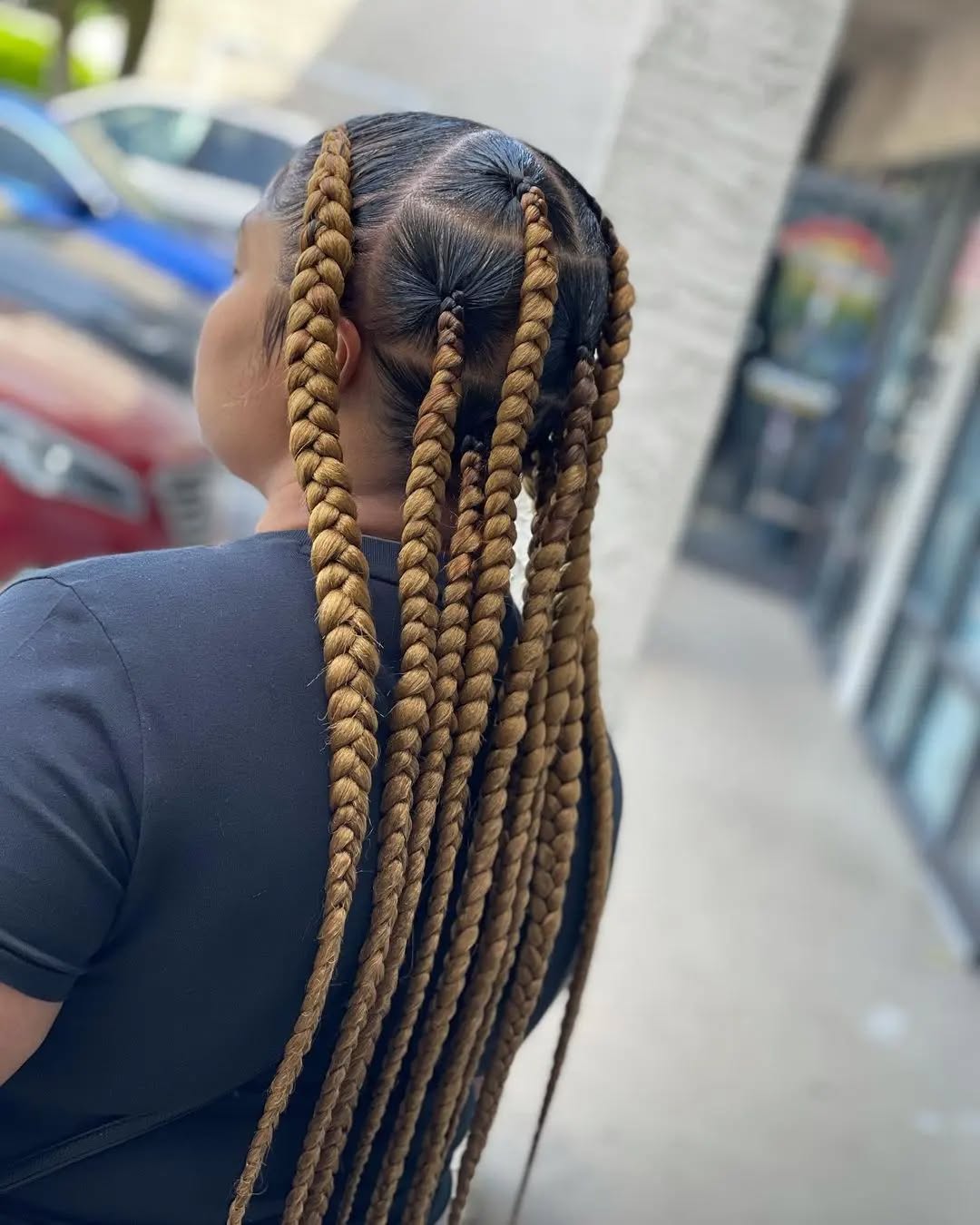 Modern Long Jumbo Braids with Intricate Parting