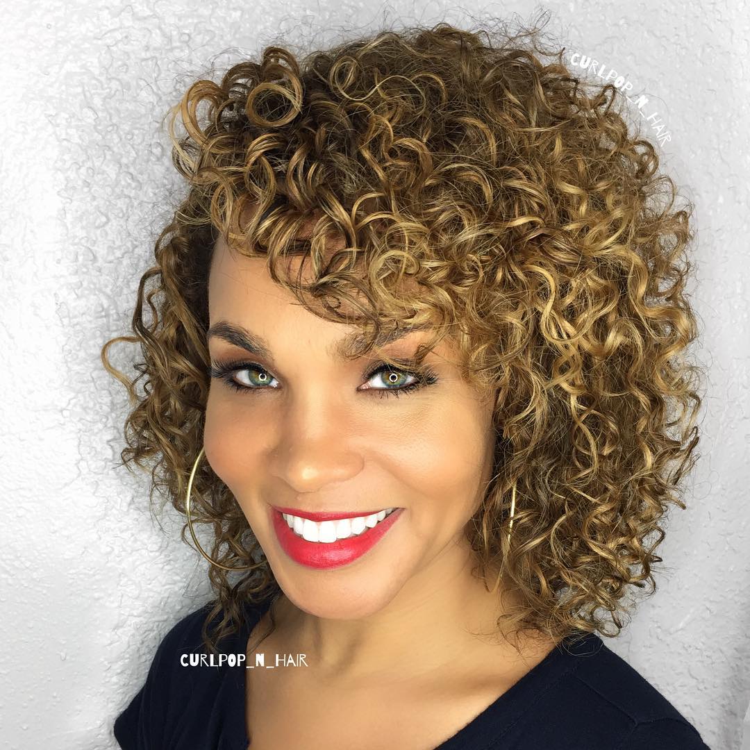 Playful Curly Bob with Wispy Bangs