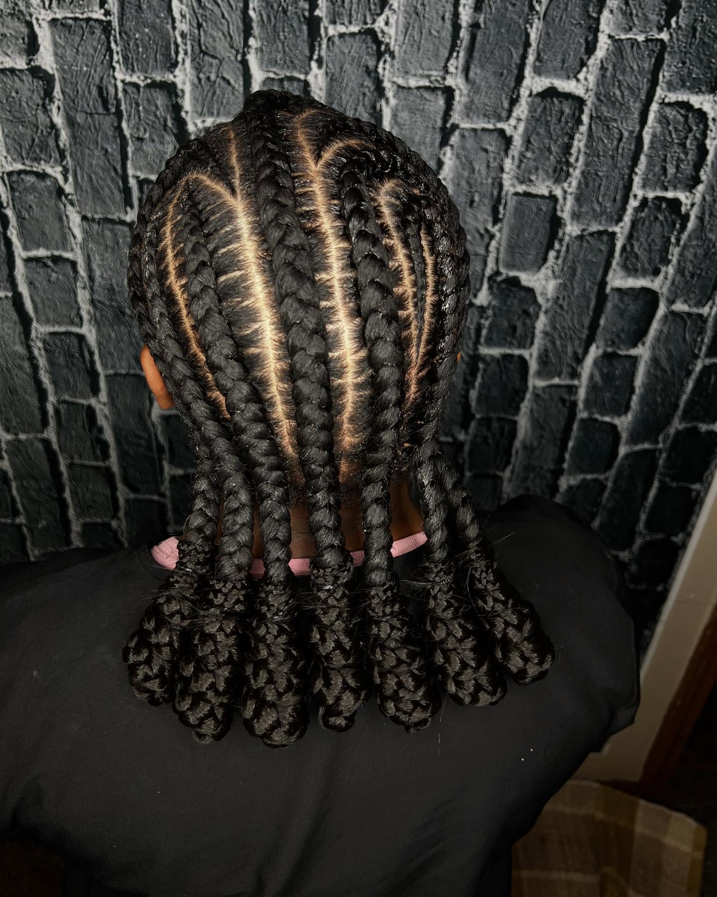 Sleek High-Volume Jumbo Braids with Defined Parting