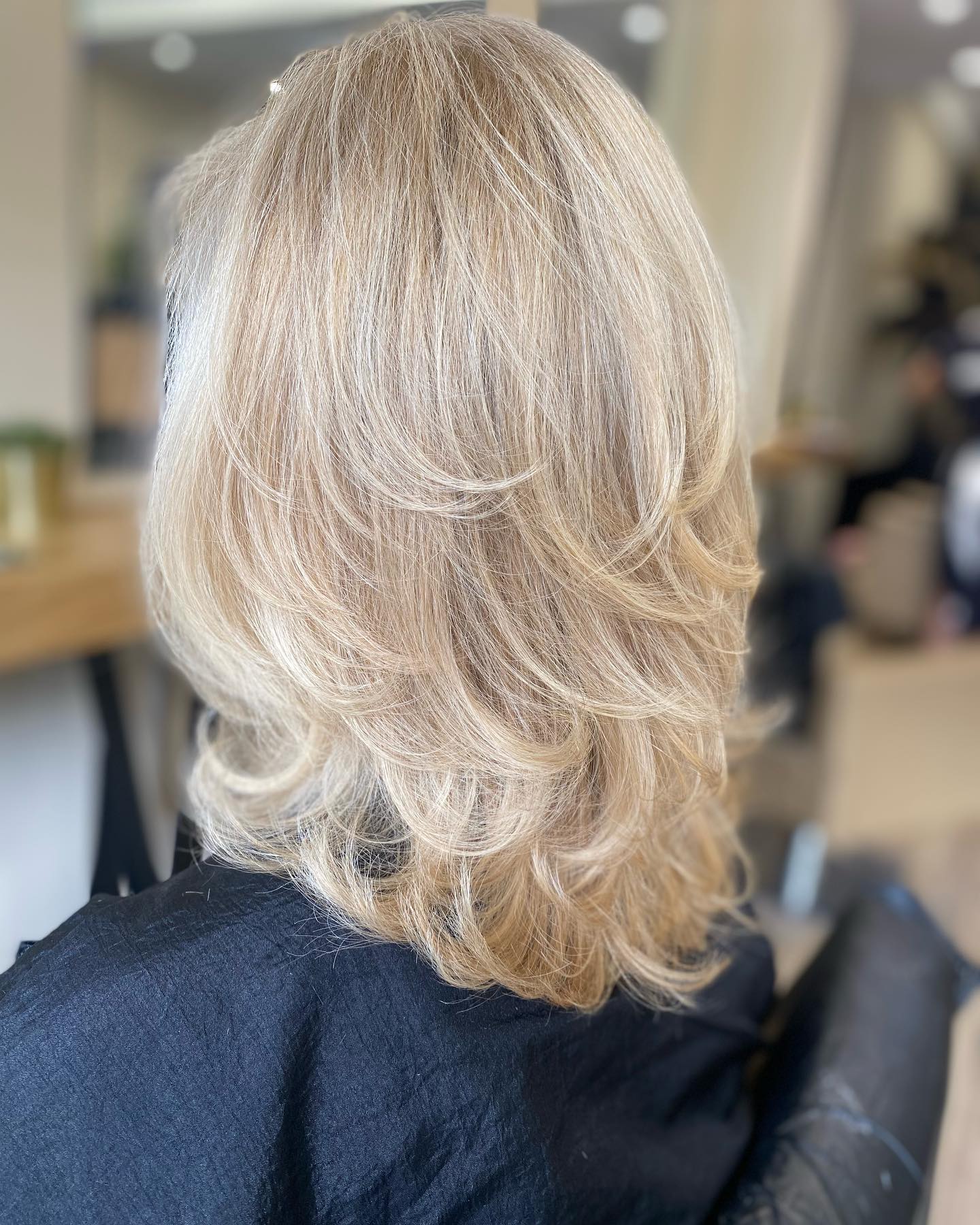 Softly Layered Blonde Cut with Natural Movement