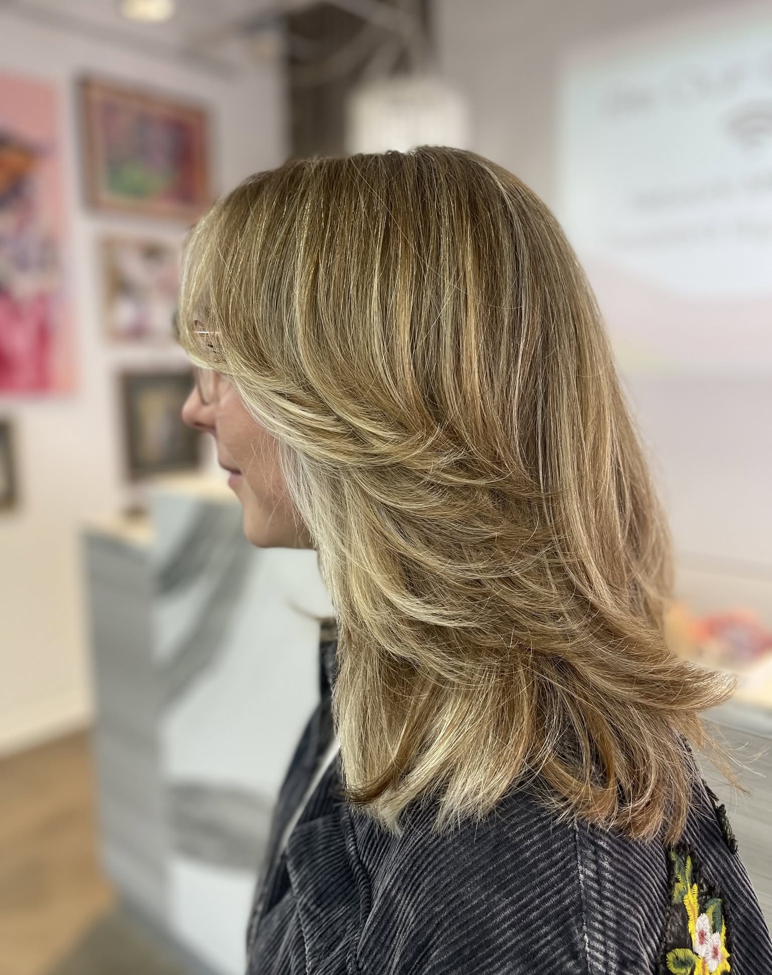 Softly Layered Golden Blonde Cut with Subtle Movement