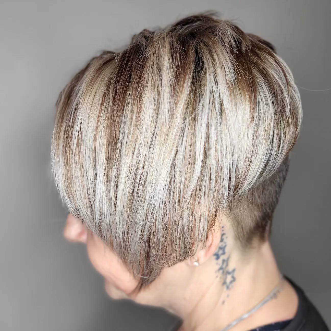 Stylish Asymmetrical Pixie with Subtle Highlights