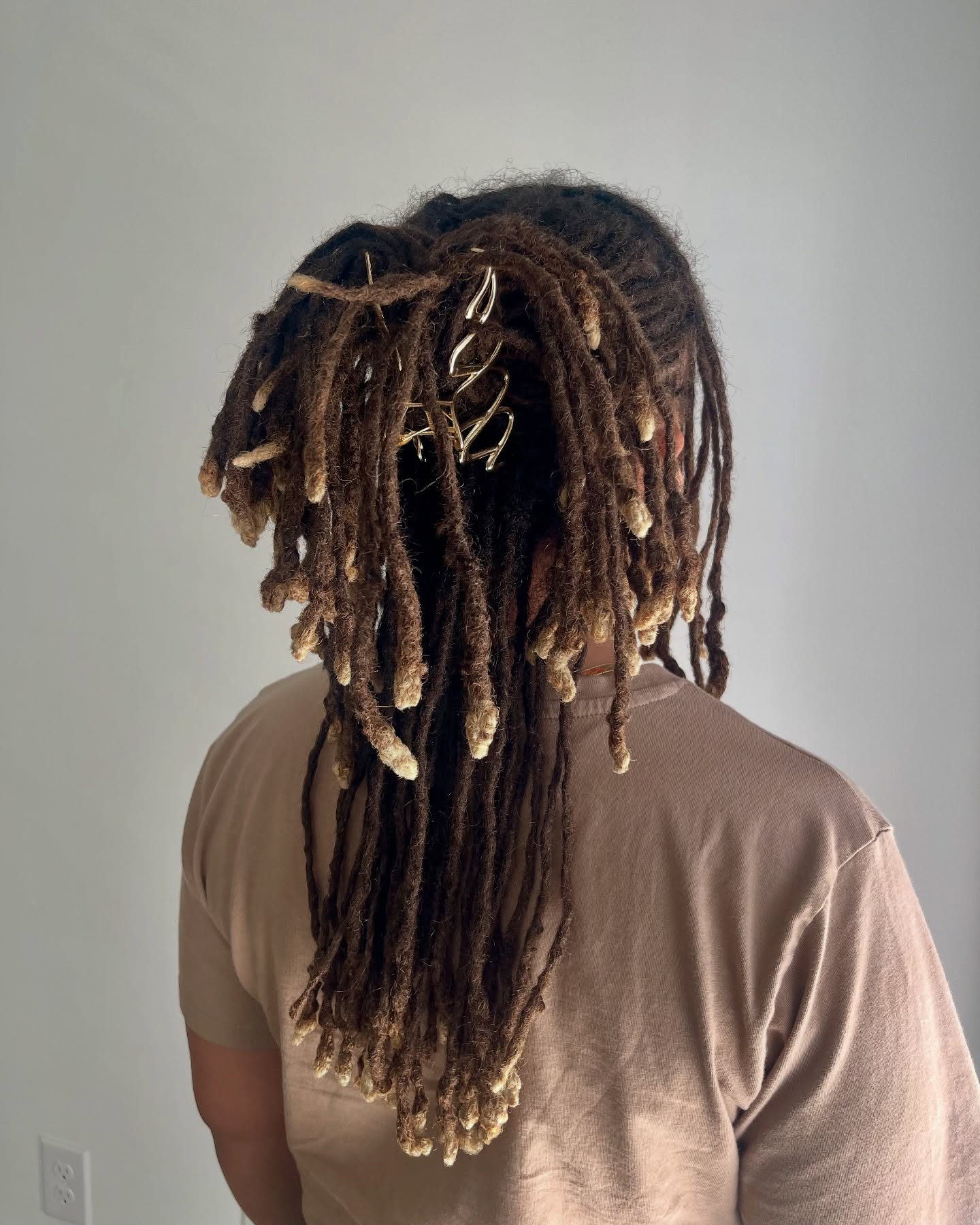 Stylish Long Locs with Unique Accents