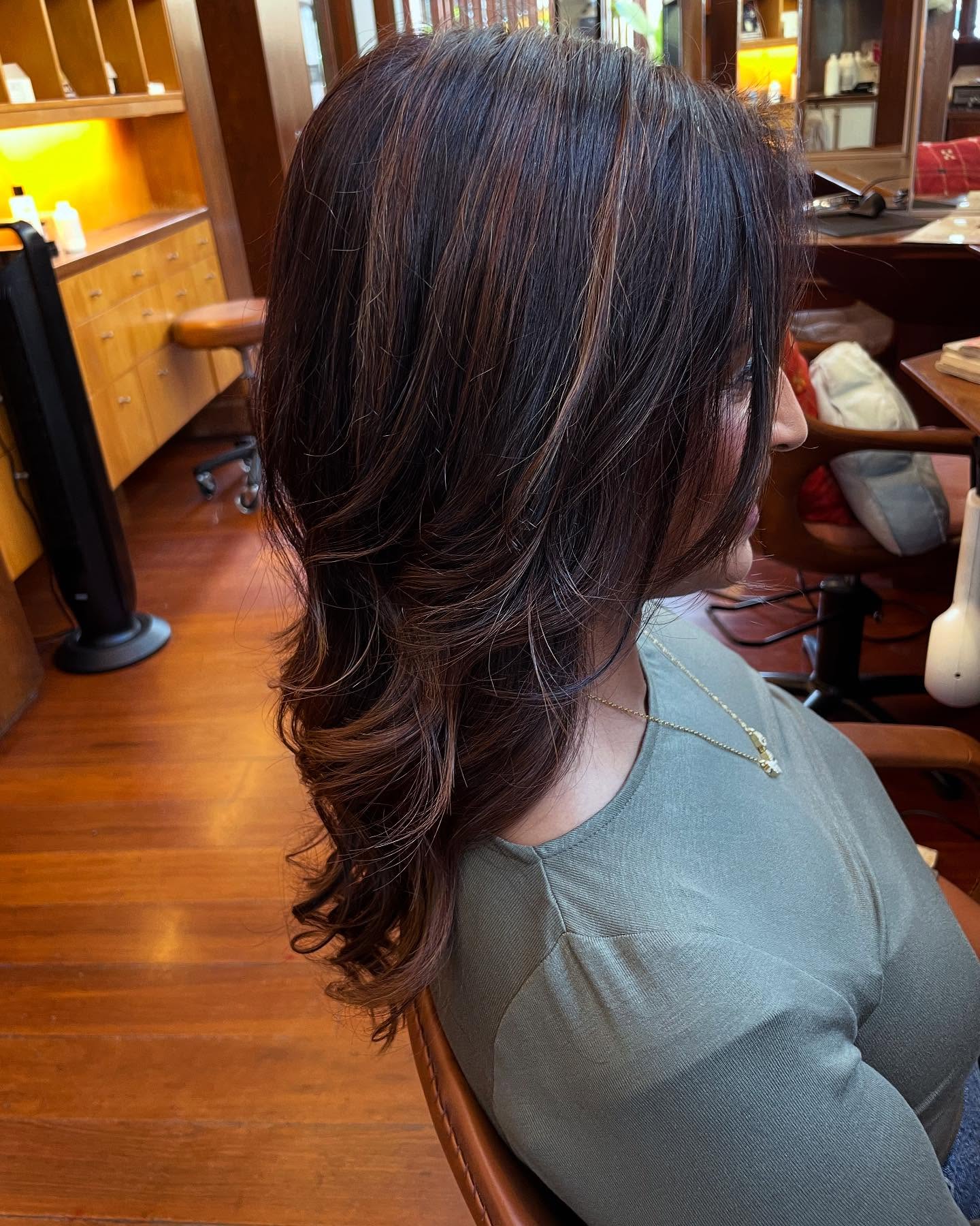 Textured Layered Cut with Warm Auburn Highlights