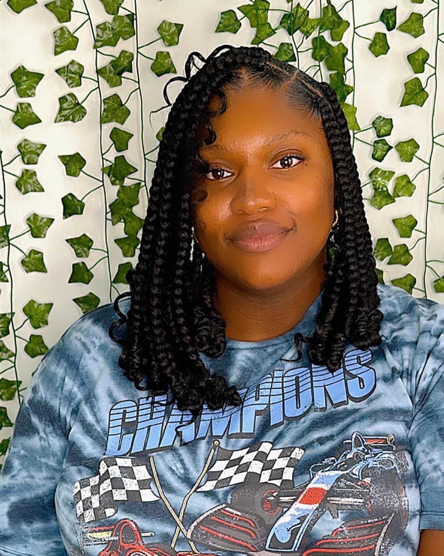 Textured Mid-Length Jumbo Braids with Playful Curls