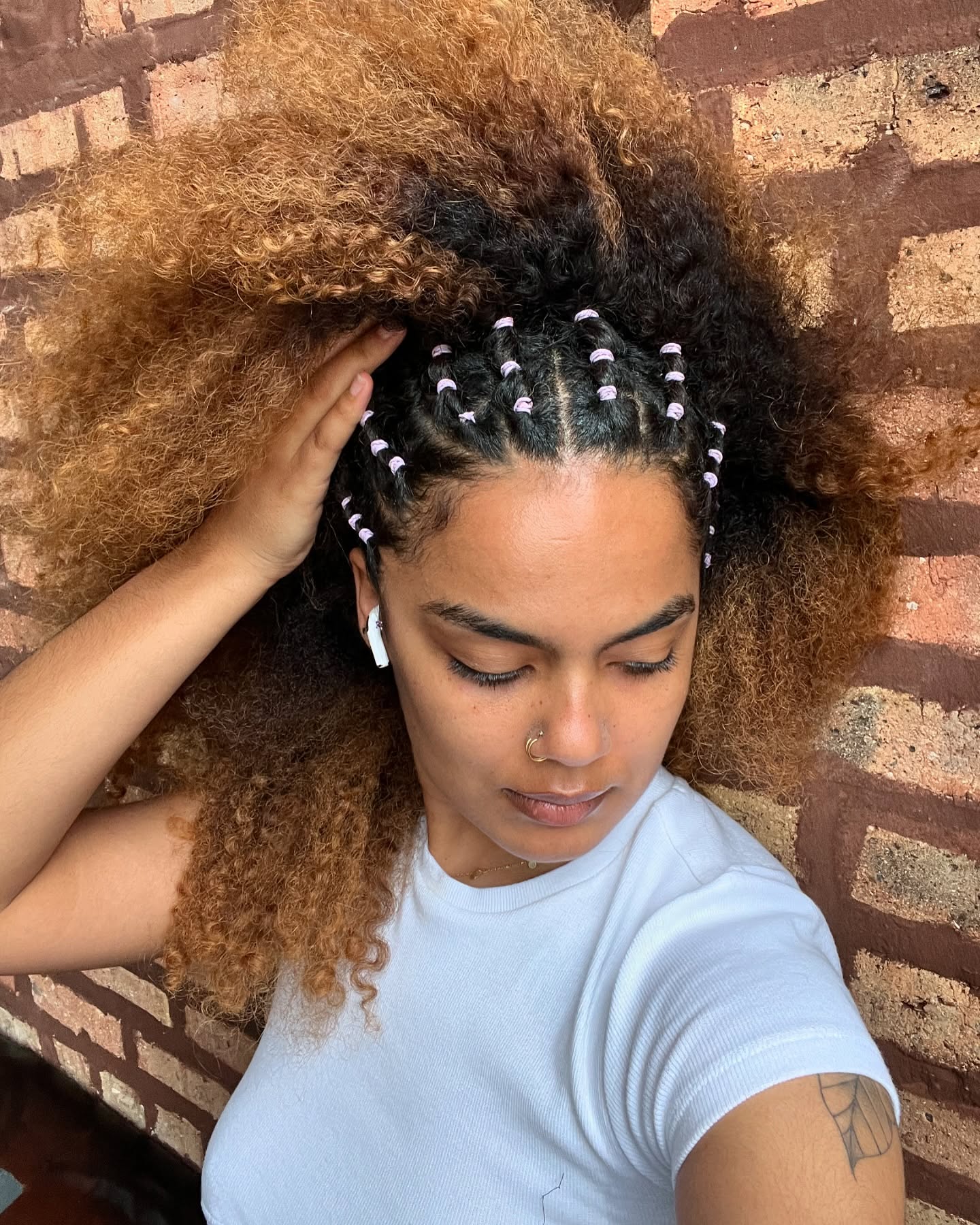 Textured Natural Curls with Intricate Beaded Braids