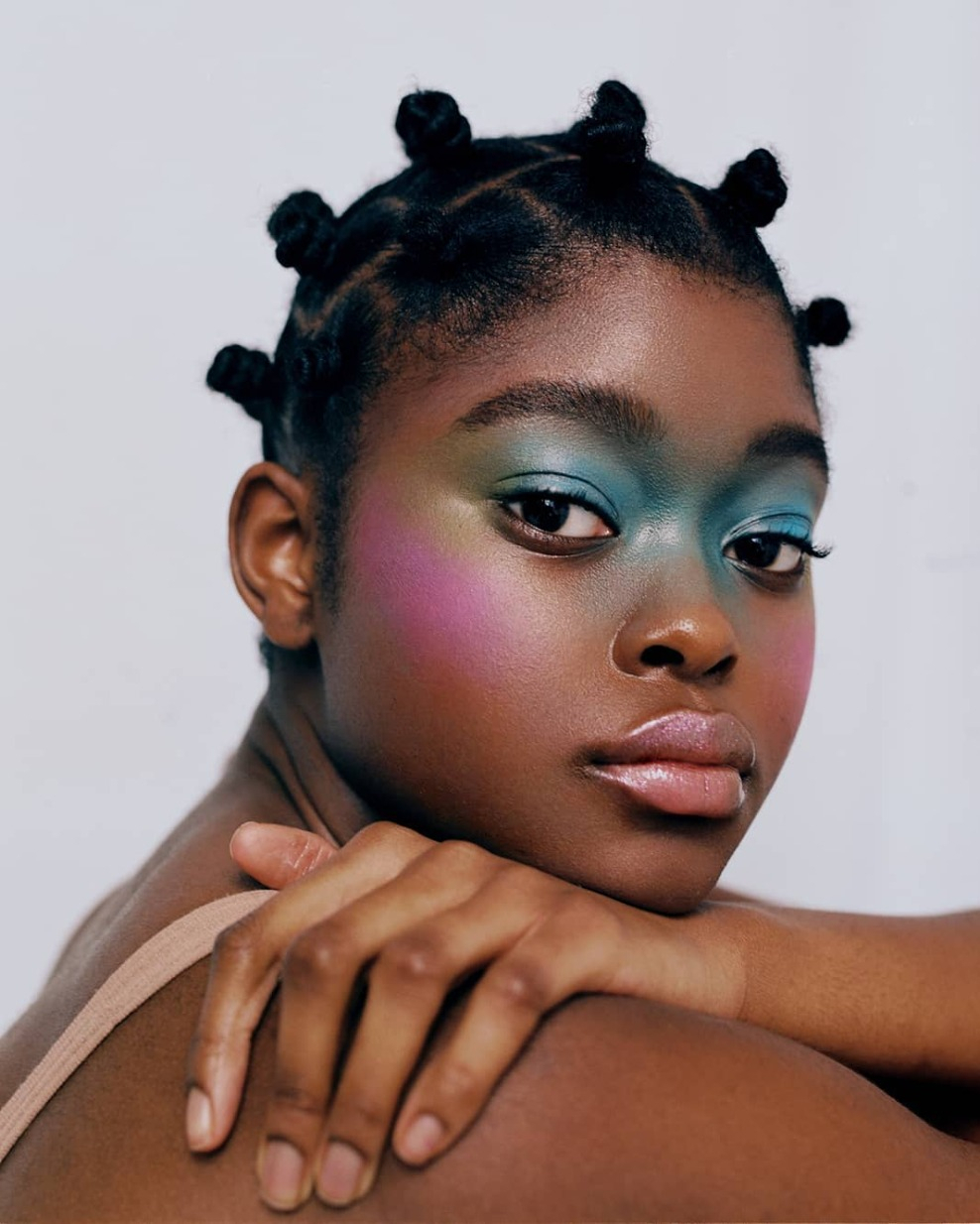 Artfully Defined Bantu Knots with Creative Color Accents