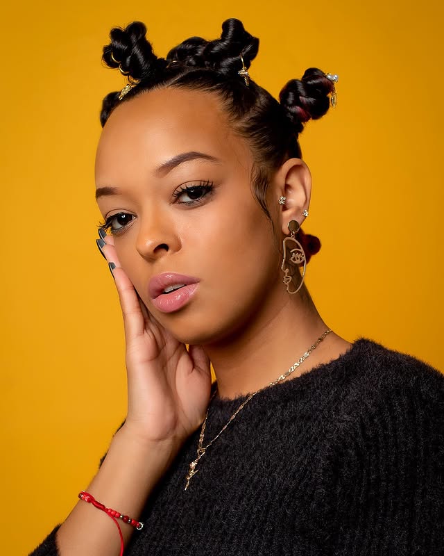 Chic Defined Bantu Knots with Decorative Accents