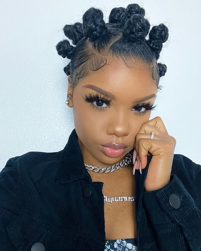 Chic Defined Bantu Knots with Intricate Parting