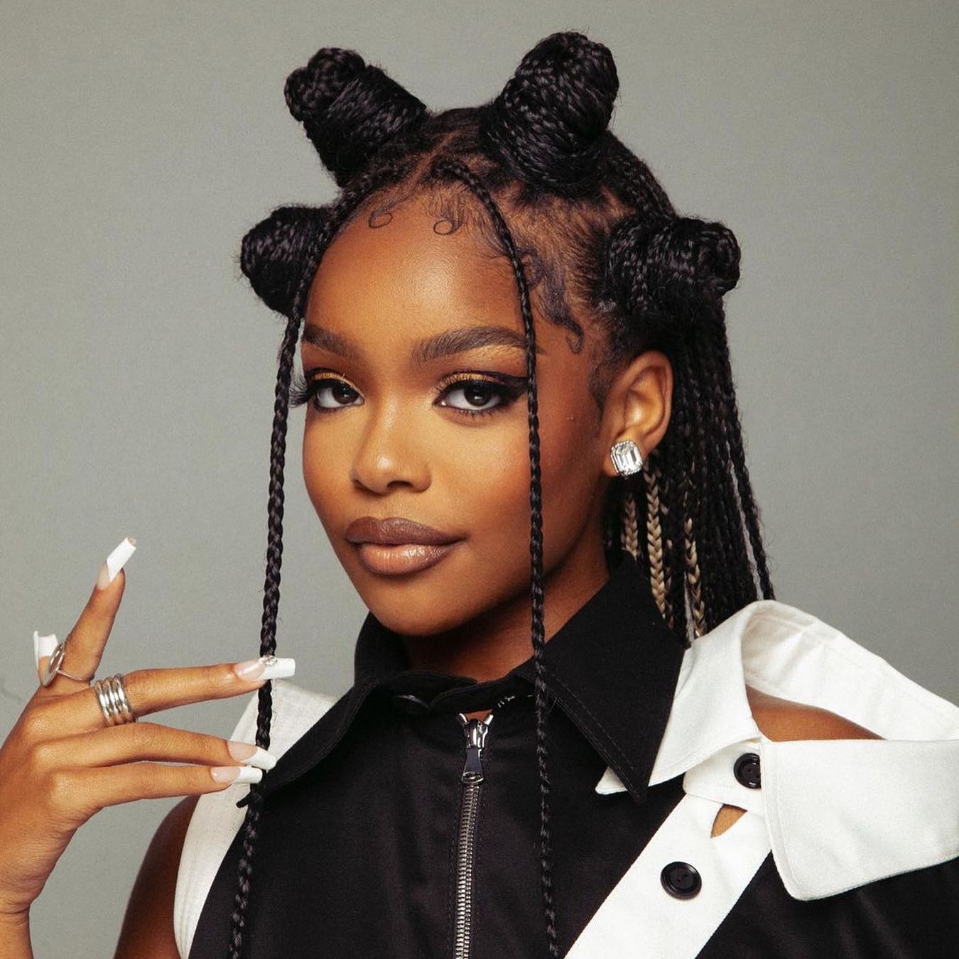 Chic Sculpted Bantu Knots with Braided Accents