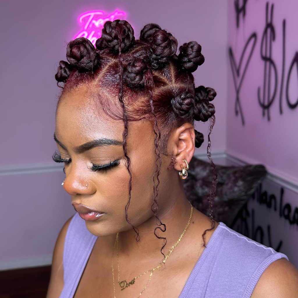 Textured Bantu Knots with Loose Tendrils