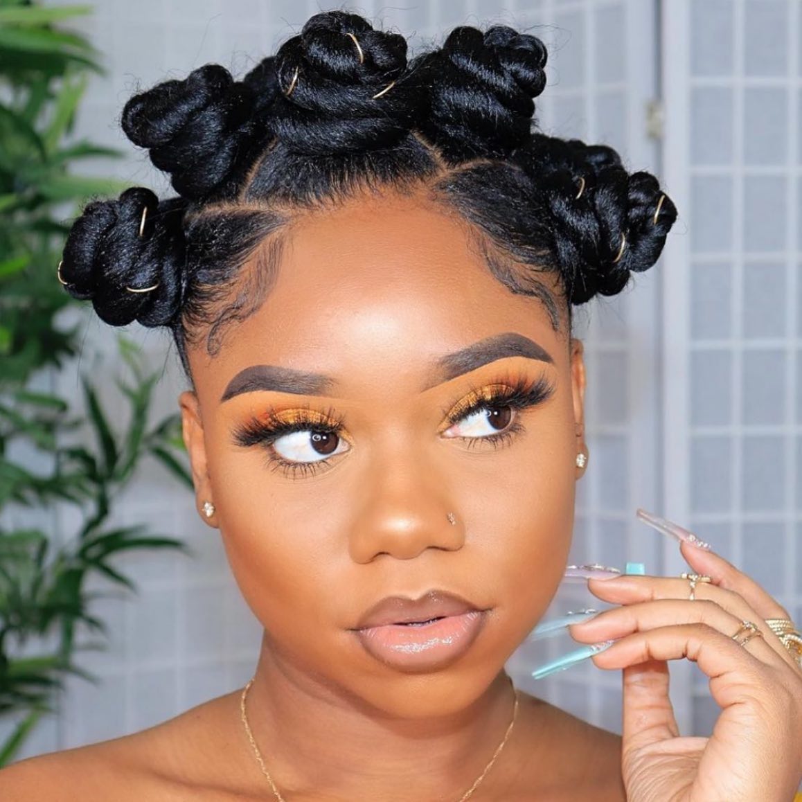 Trendy High-Definition Bantu Knots with Golden Accents