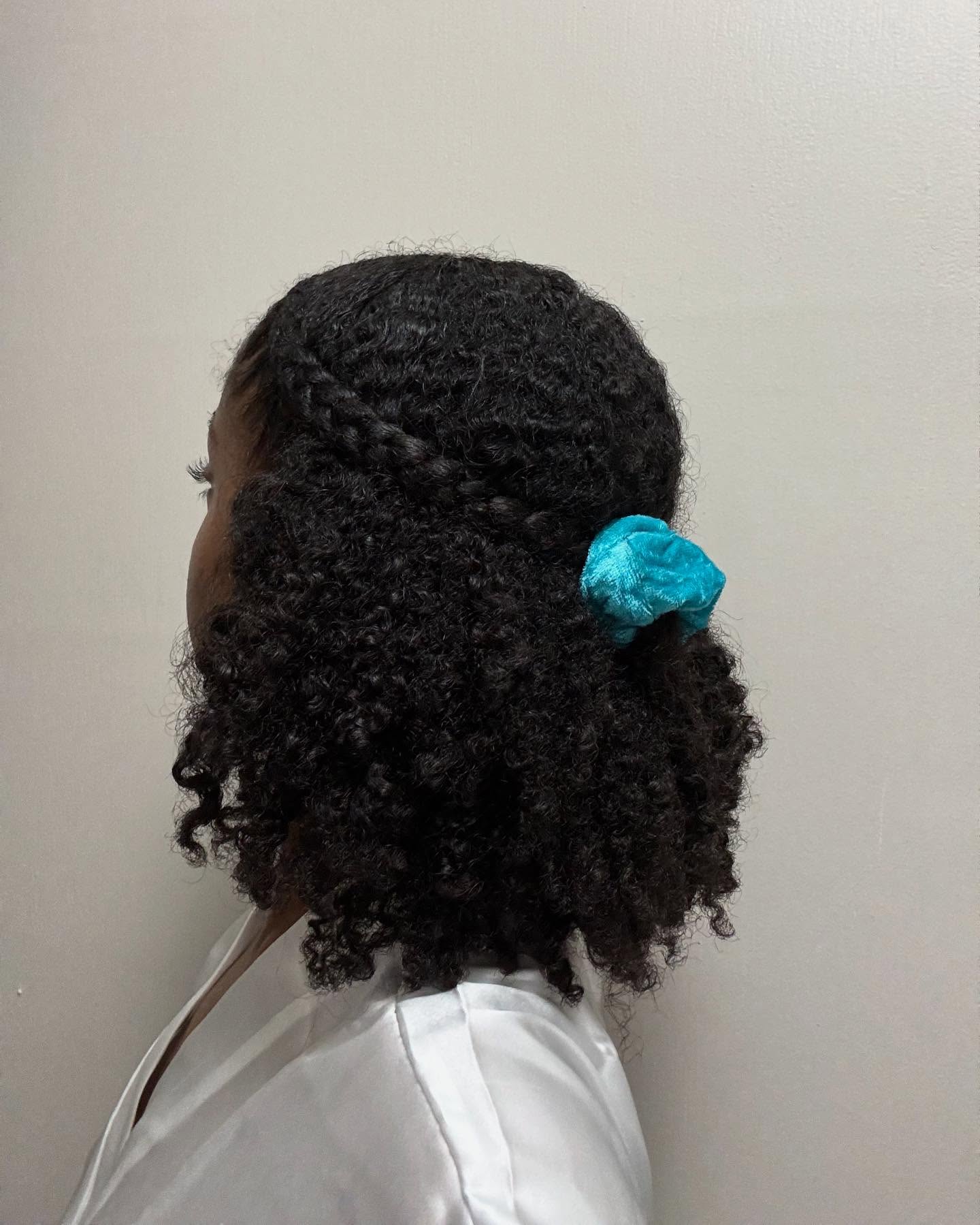 Charming Coily Half-Up Style with Decorative Scrunchie