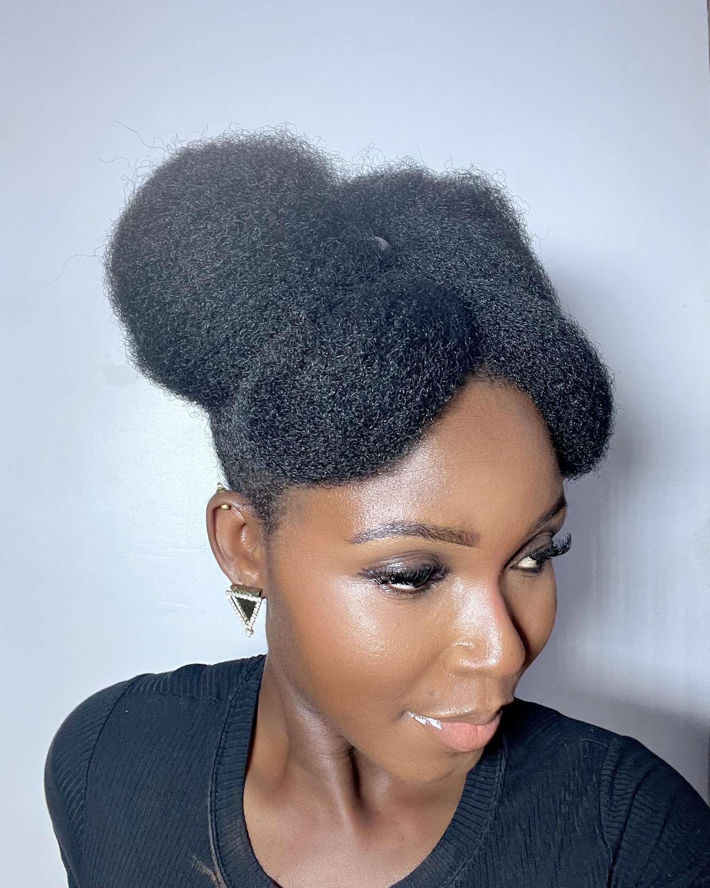 Chic Double Coily Bun with Textured Volume