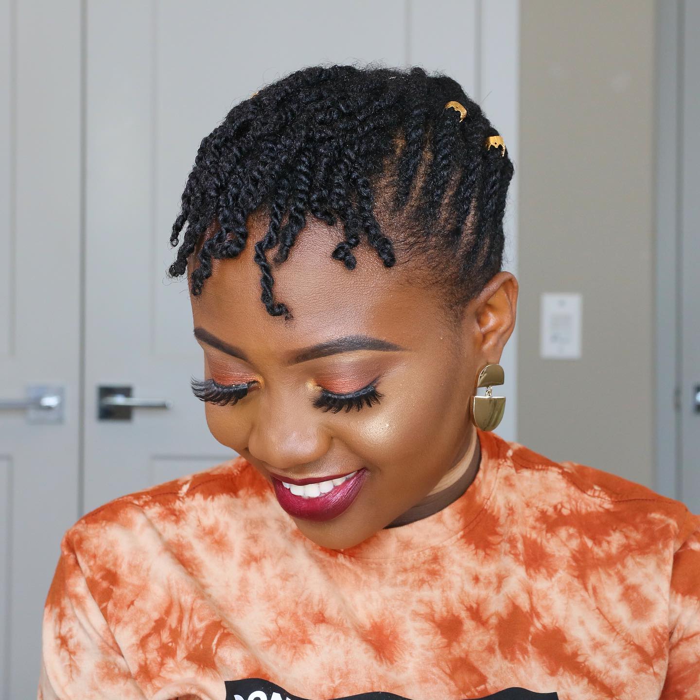 Chic Twisted Coily Updo with Accents