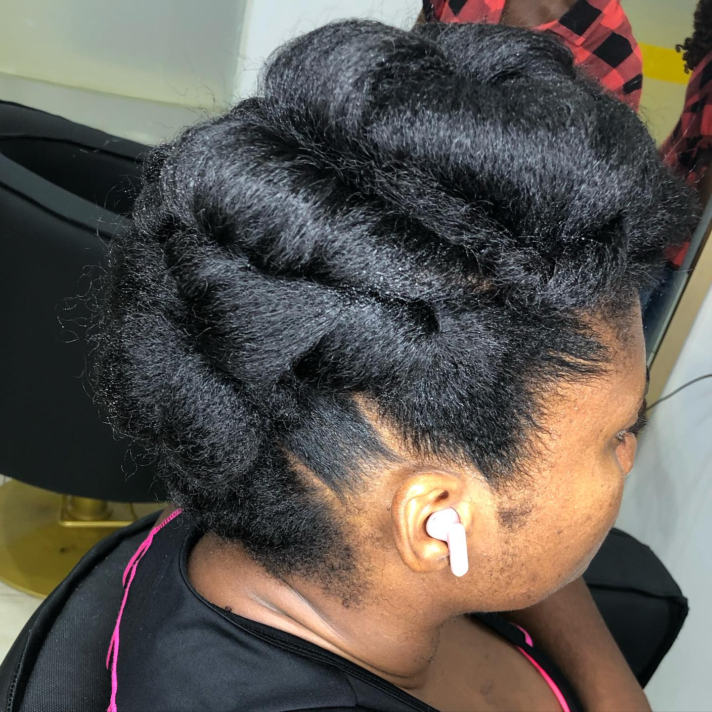 Elegant Twisted Coily Updo with Defined Sections