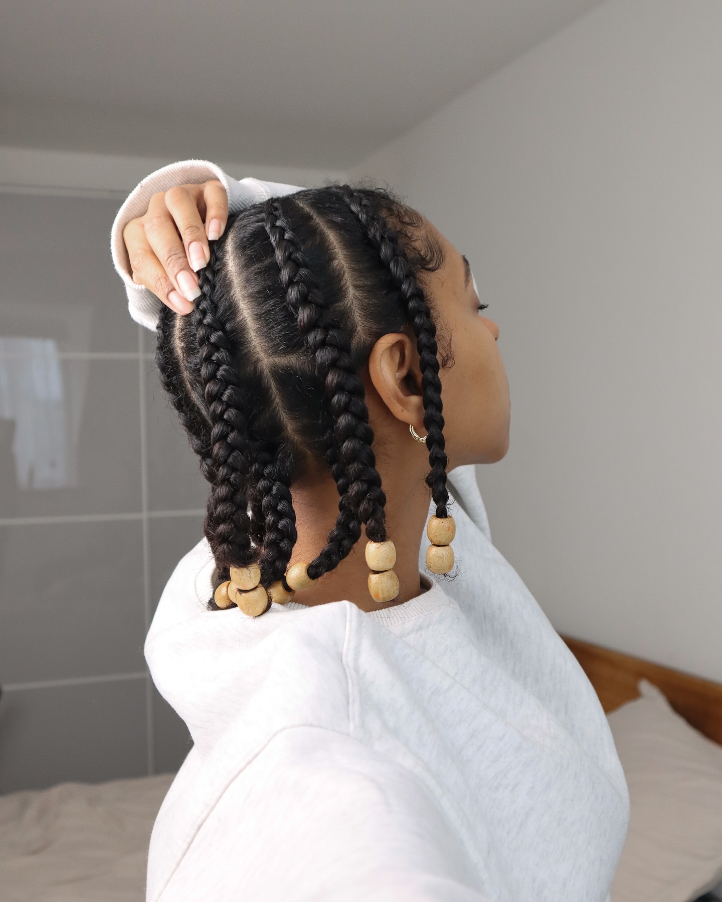 Stylish Coily Braids with Decorative Beads