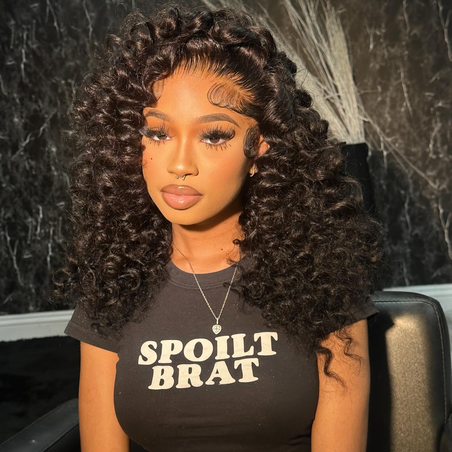 Voluminous Defined Coily Curls with Face-Framing Layers