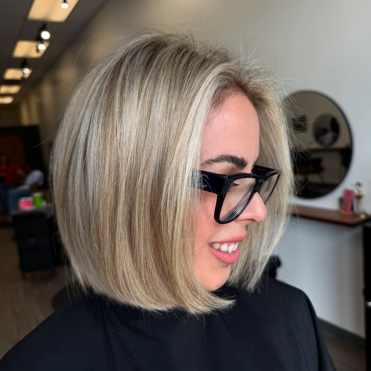 Chic Angled Bob with Subtle Ash Blonde Highlights