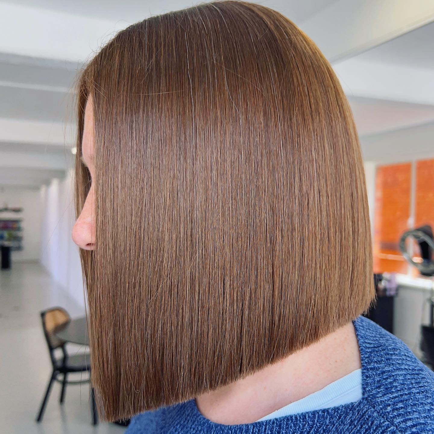 Sleek Angular Bob with Rich Chestnut Tones
