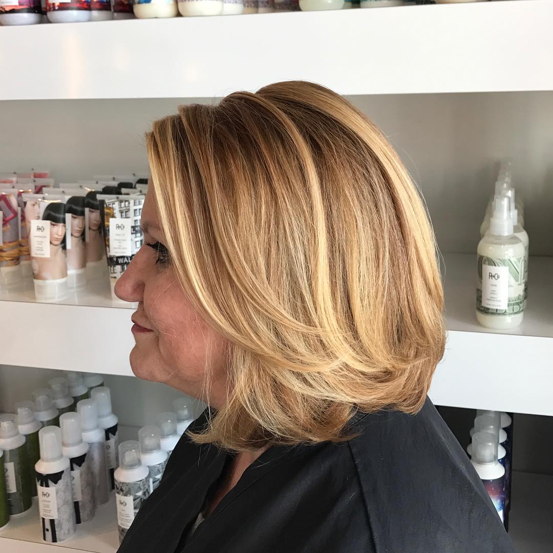 Classic Layered Blonde Bob with Subtle Movement