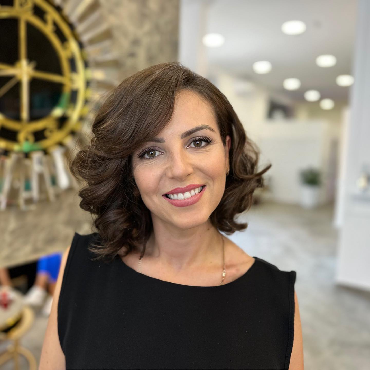 Elegant Curled Bob with Soft Side Bangs