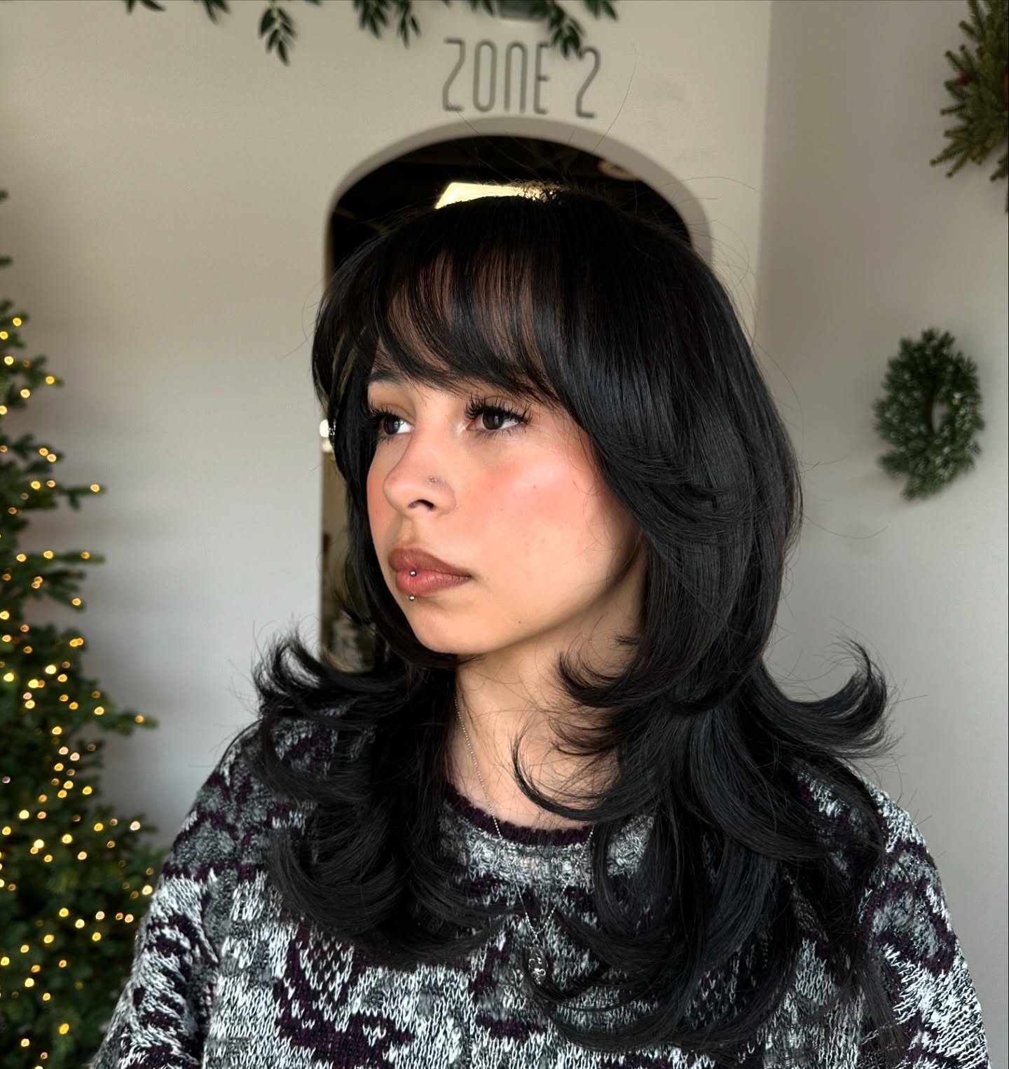Softly Layered Black Hair with Face-Framing Bangs