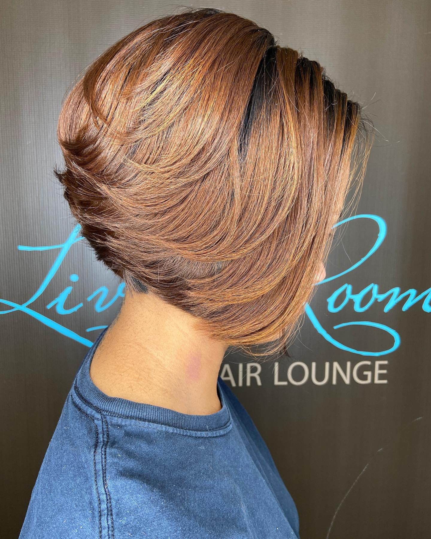Stylish Layered Feathered Bob with Warm Copper Undertones