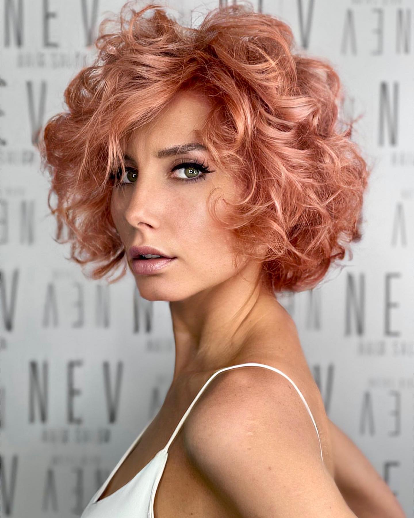 Textured Coral Wavy Bob with Soft Bangs
