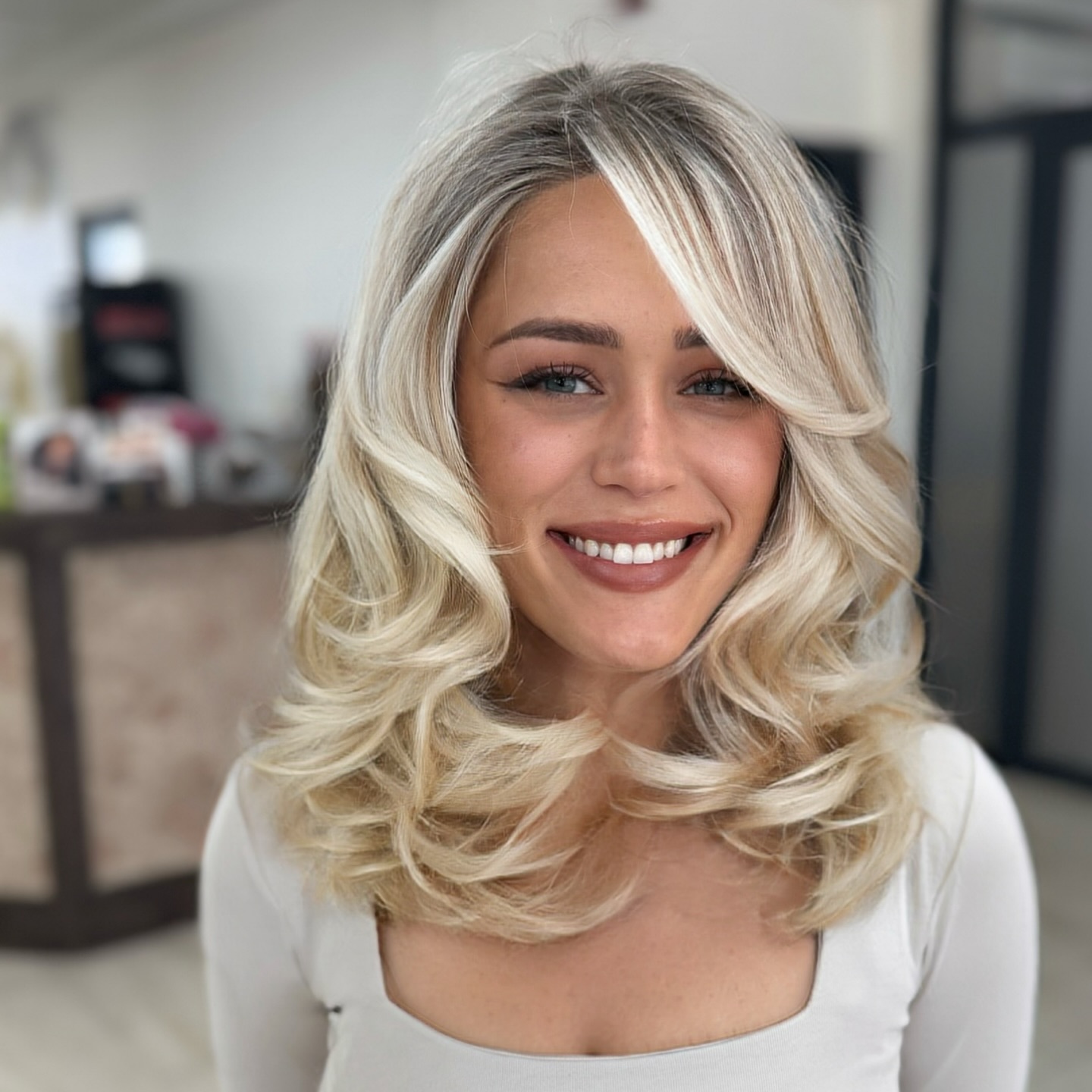 Textured Medium-Length Waves with Soft Side Bangs