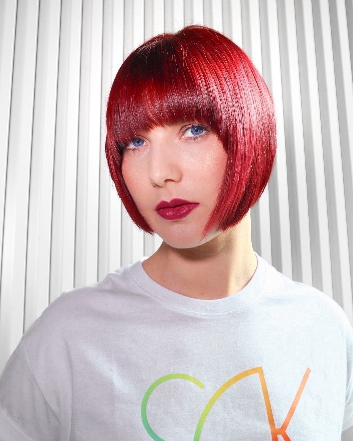 Bold Cherry Red Blunt Bob with Straight Fringe