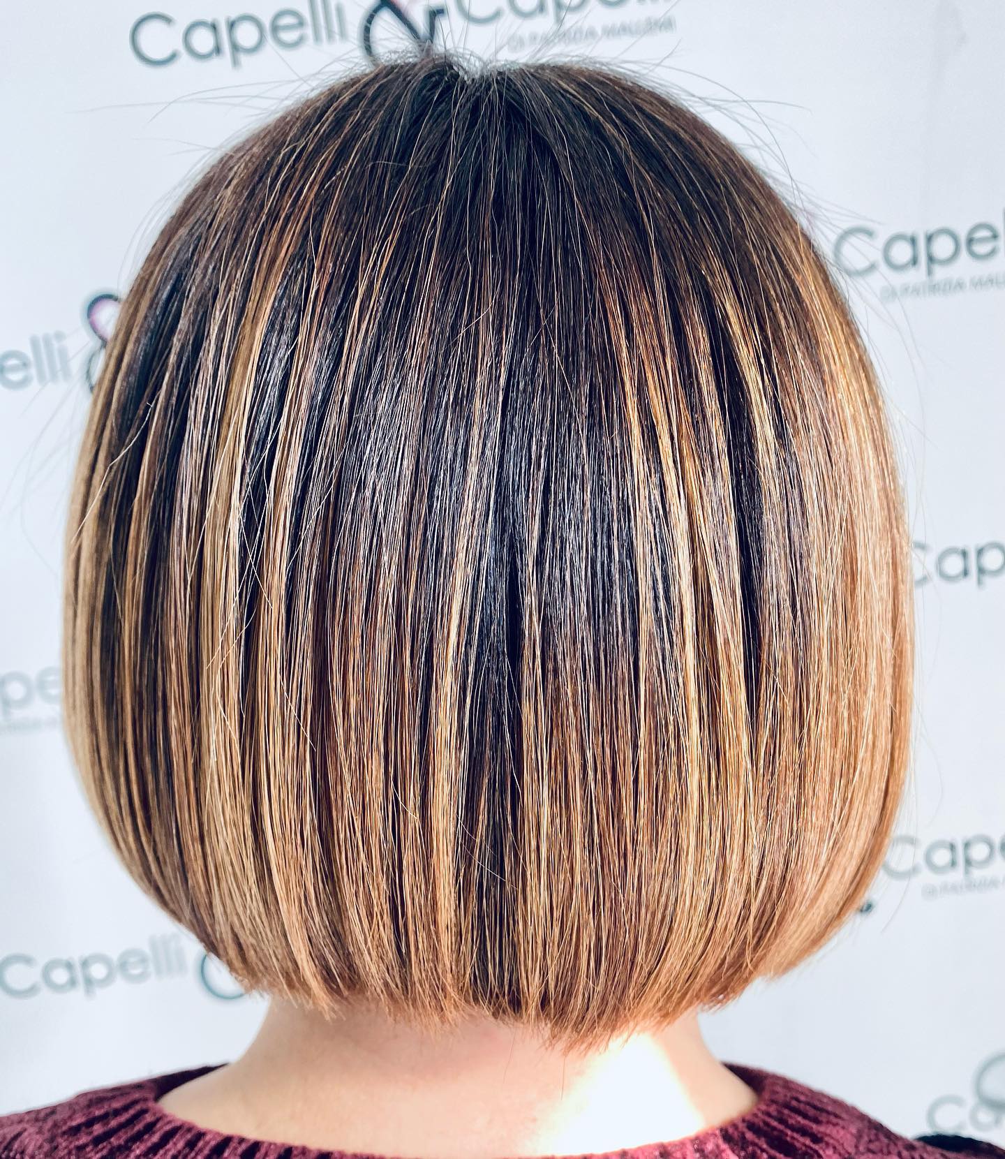 Glossy Asymmetrical Bob with Subtle Highlights