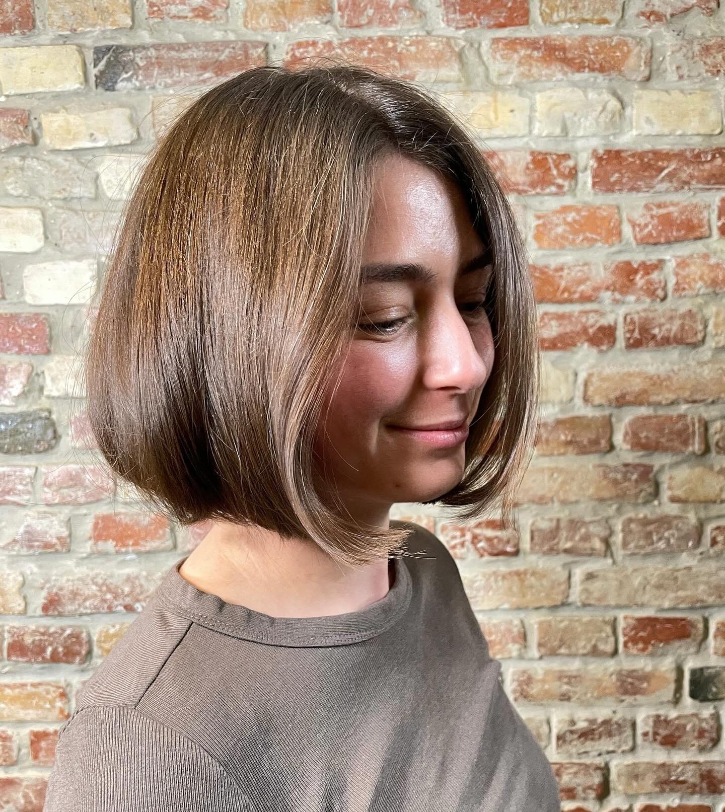 Chic Soft Brown Rounded Bob with Subtle Highlights
