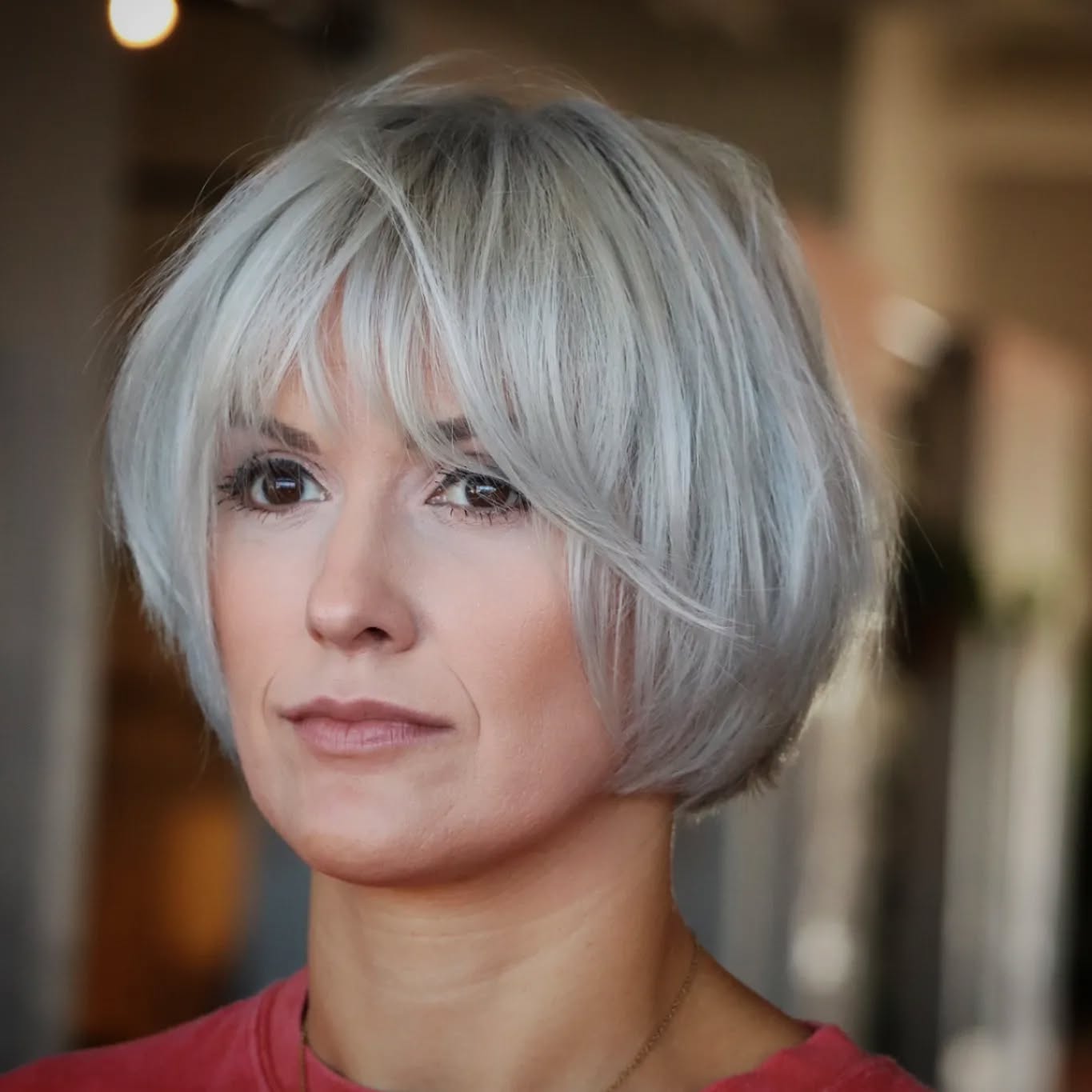 Chic Soft Silver Rounded Bob with Textured Bangs