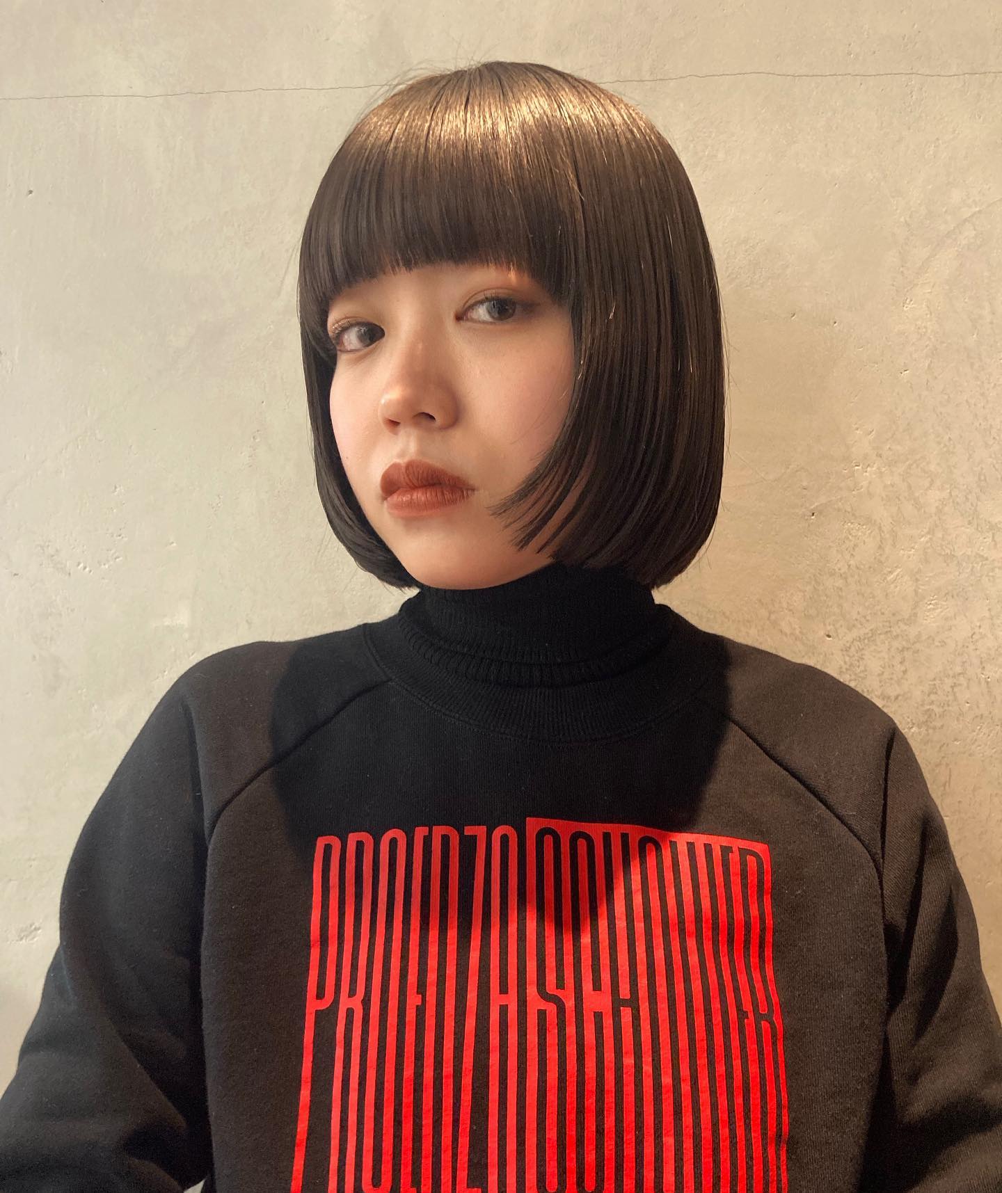 Sleek Blunt Bob with Straight Across Bangs