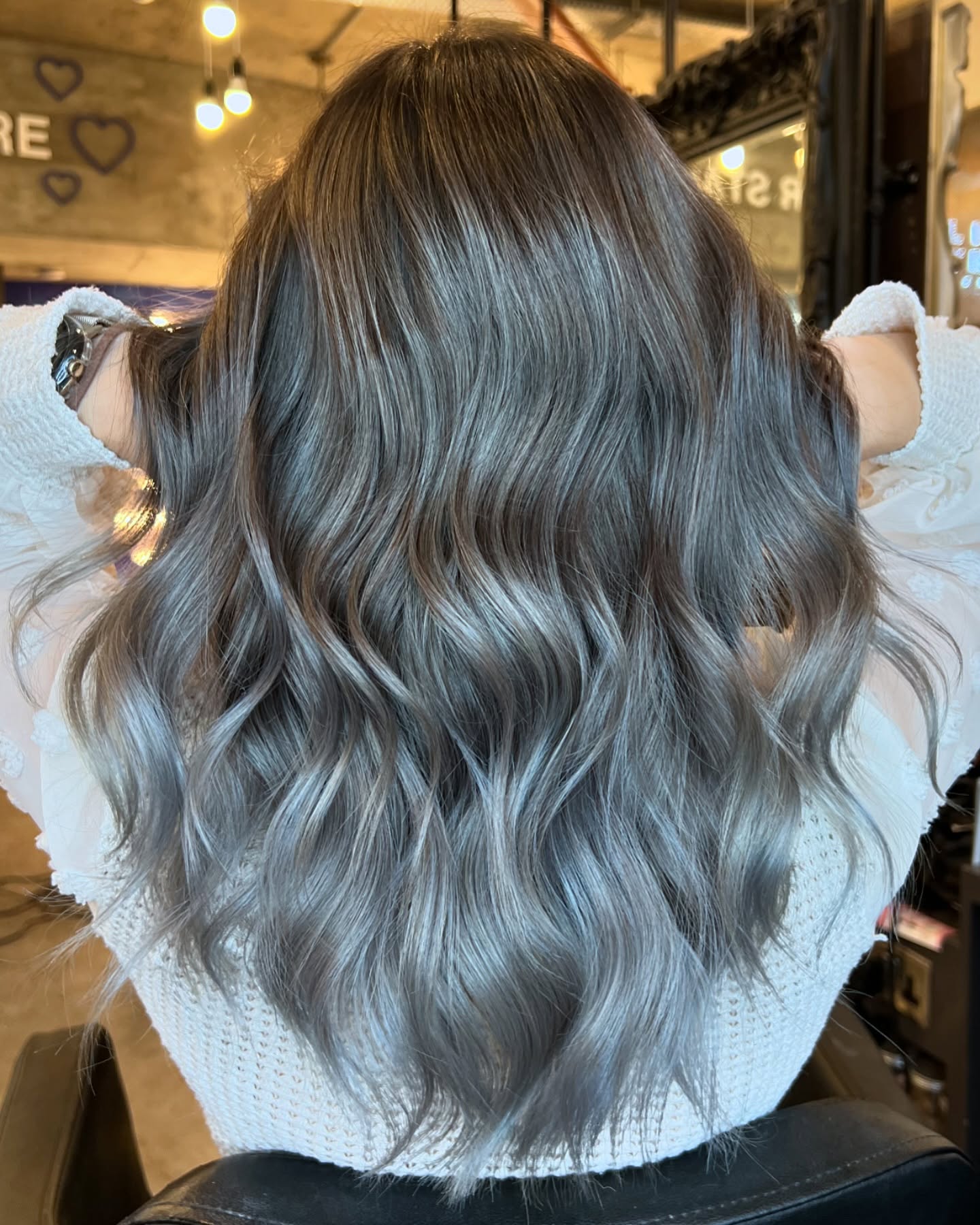 Soft Wavy Grey Balayage with Subtle Dimension