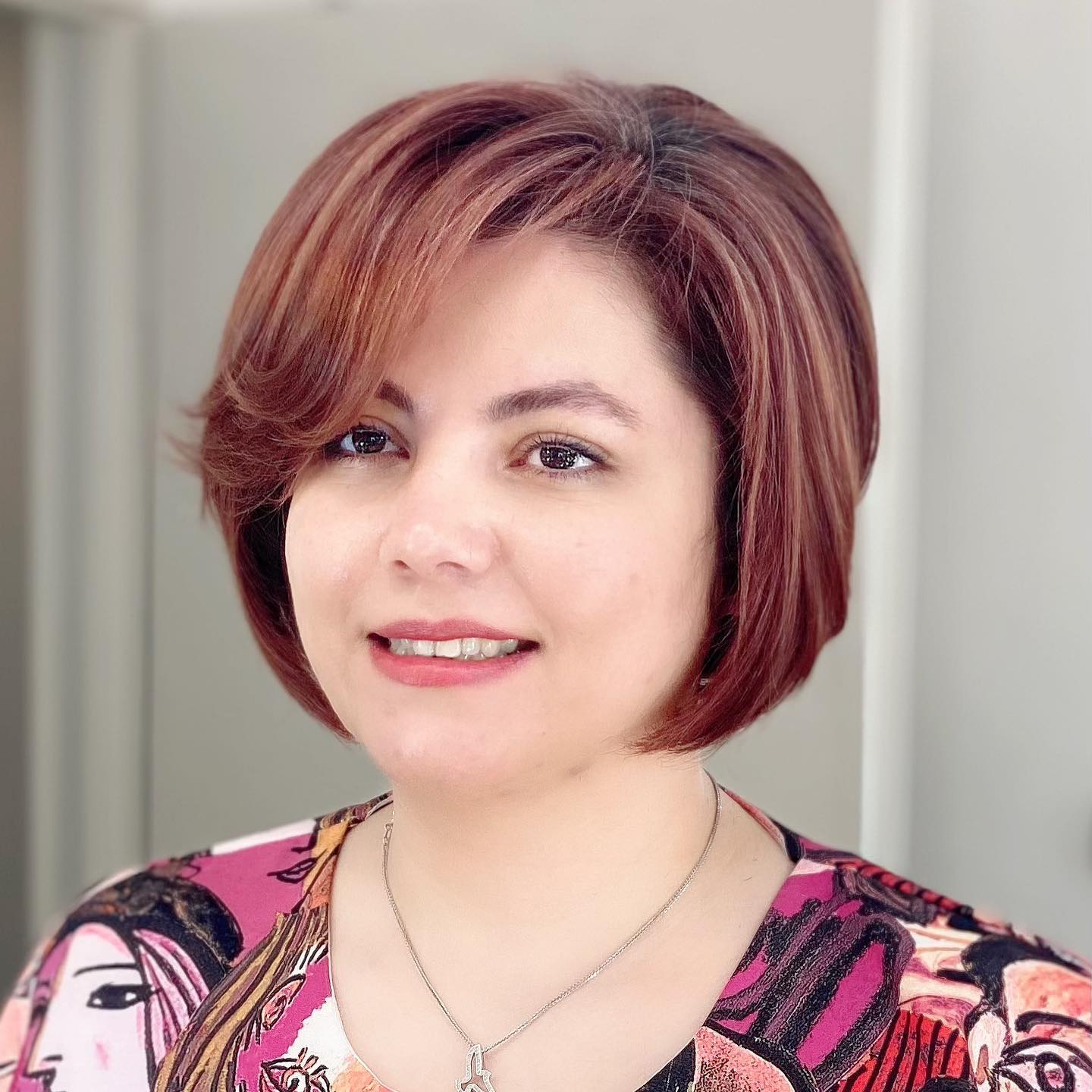 Stylish Warm Copper Rounded Bob with Soft Layers