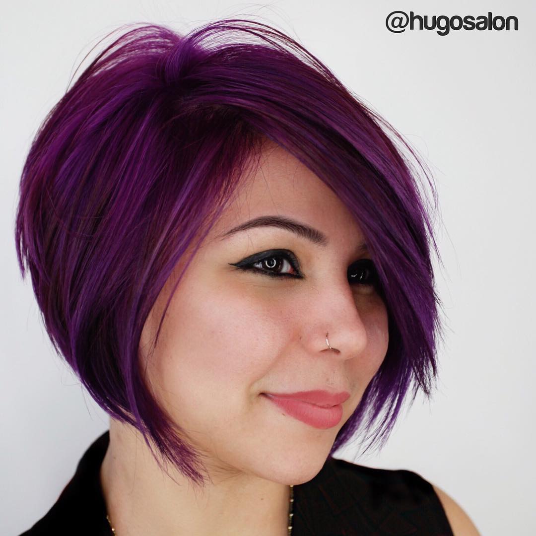 Vibrant Asymmetrical Bob with Bold Purple Highlights