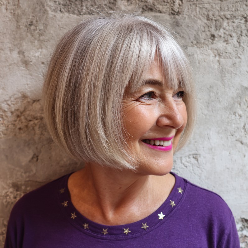 Chic Textured Silver Bob with Face-Framing Bangs