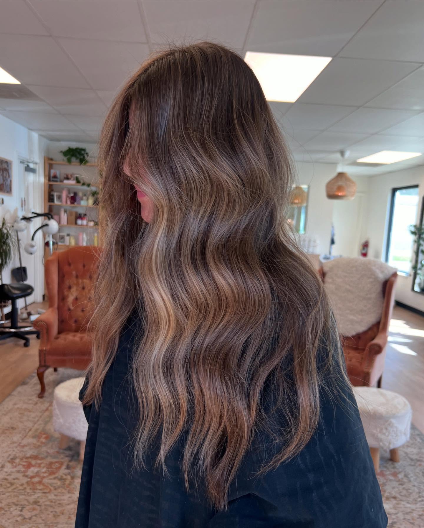 wavy bronde hair with subtle highlights