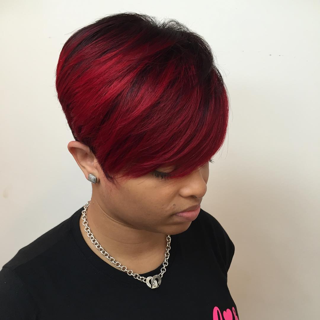 Bold Textured Pixie Cut with Red Highlights