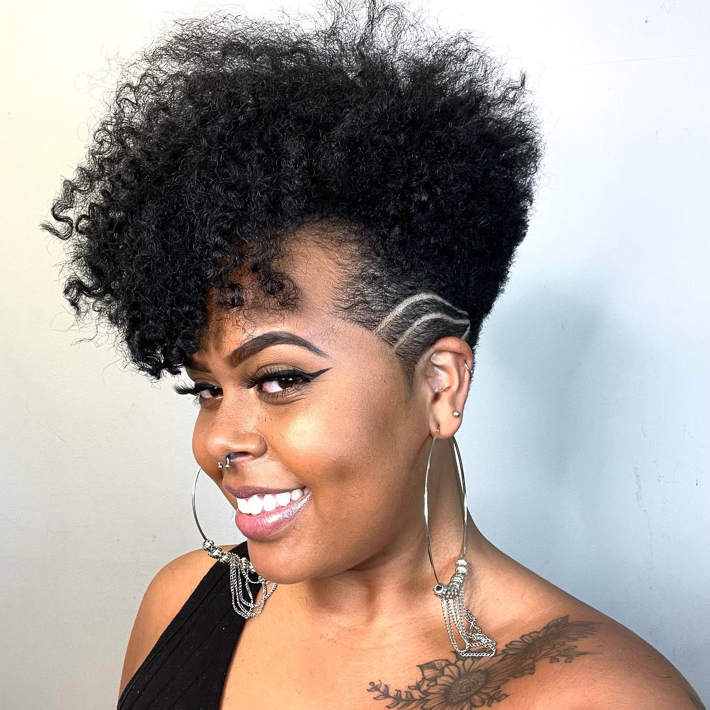Dynamic Curly High Top with Undercut and Design