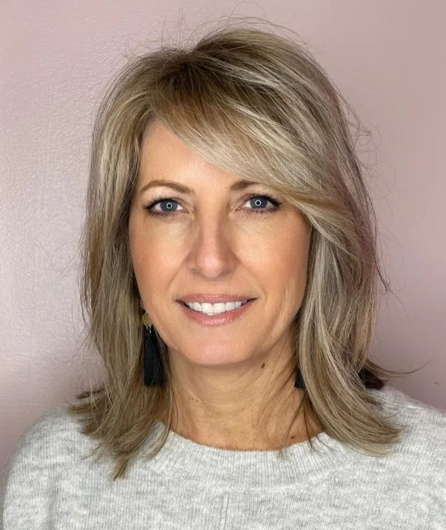 Modern Face-Framing Layers with Soft Bangs